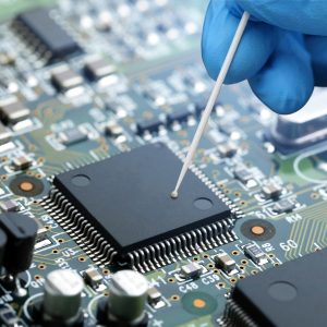 Closeup of electronic circuit board with CPU microchip electronic components background